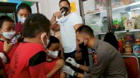 Polda Sulsel Roadshow Vaksin Pelajar SD Paccinang dan Paccinang 1 Makassar